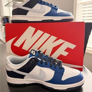 Nike dunk low in color white/football grey – game royal